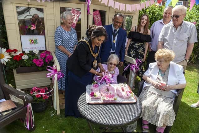 Worthing mayor Henna Chowdhury attended the party at Highgrove House care home with her consort Millad Chowdhury and cut the cake to celebrate Joan Tampin's 100th birthday