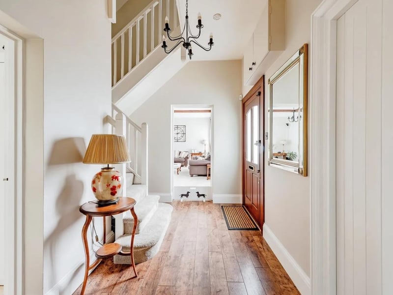 The home has a welcoming entrance hallway