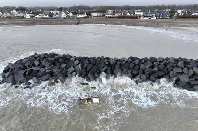 Authorities responded to a shipping container, that washed ashore at Elmer, on Monday (January 12)