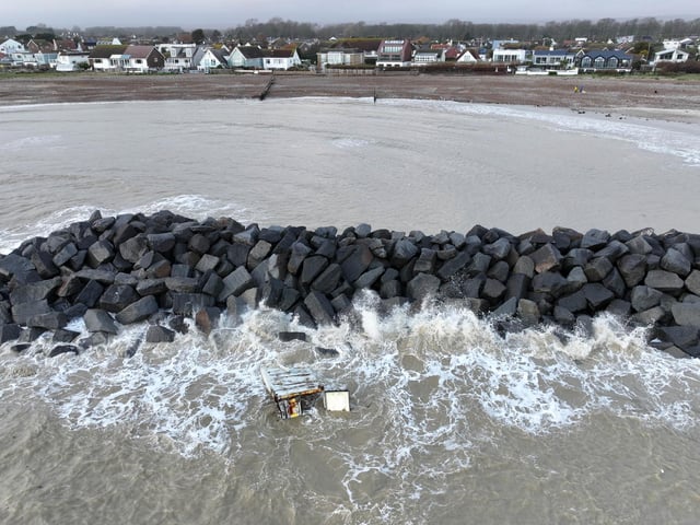 Authorities responded to a shipping container, that washed ashore at Elmer, on Monday (January 12)