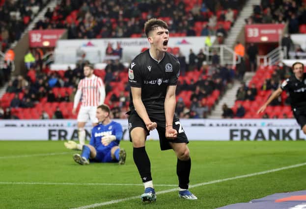 Andrew Moran of Blackburn Rovers celebrates after scoring the team's second goal during the Sky Bet Championship match between Stoke City and Blackburn Rovers at Bet365 Stadium on November 25, 2023 in Stoke on Trent, England. (Photo by Jess Hornby/Getty Images)