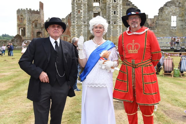 Midhurst Players as Winston Churchill (Dennis Harrison), The Queen (Zilch Cox) and Beefeater (Andy Gilson) at the Jubilee celebrations at the Cowdray Ruins. Picture: Liz Pearce 04/06/2022