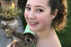 Graci Hanlon-Field with her pet rabbit Charles Dickens