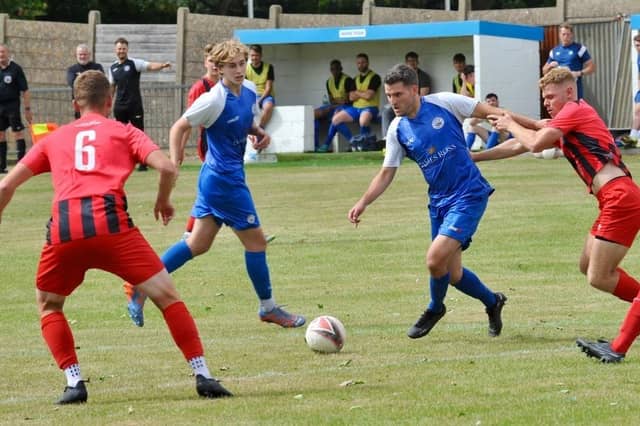 Action from a pre-season friendly between Shoreham and Worthing United at Middle Road