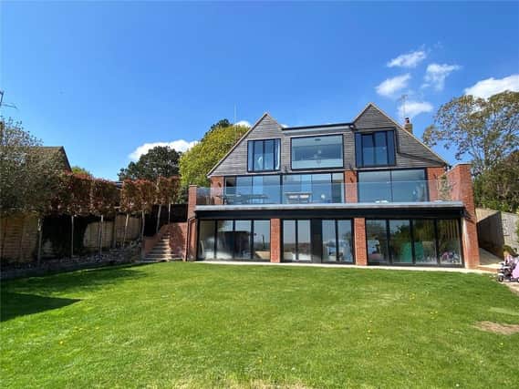 The property has been described as an 'outstanding detached house of luxurious contemporary design'