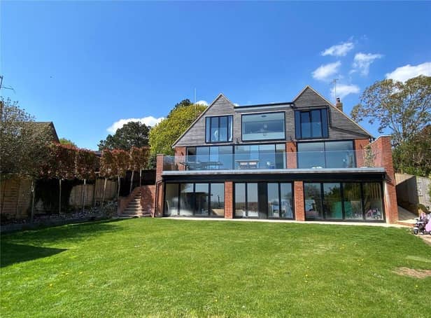The property has been described as an 'outstanding detached house of luxurious contemporary design'