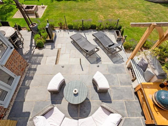 The home offers a wrap around beautifully landscaped garden