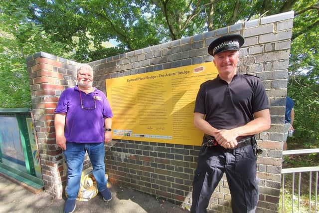 The renovation of a bridge at the Cuckoo trail in Hailsham has been unveiled by artist Tony Biggins and officers from Sussex Police. Picture: Wealden Police