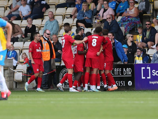 Action from Worthing's 3-0 win at Torquay United which put them top of National League South