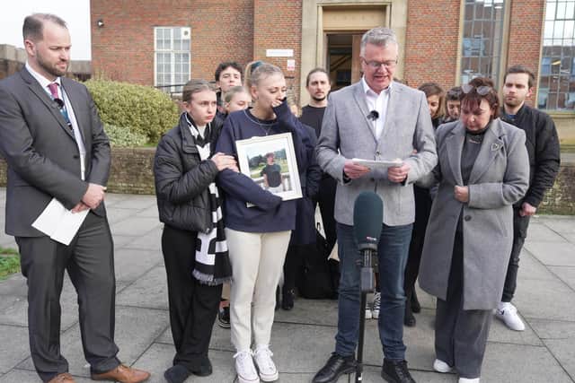 Harrison Tomkins' father Chris (centre) addresses the public after Kaydon Prior, 23, of Hazelwick Avenue, Crawley, and Jason Curtis, 22, of Lairdale Road, Lambeth, London, were found guilty of his murder following a four-week trial