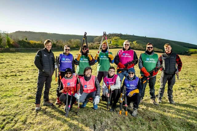 American Express volunteers with the Park's rangers on the edge of Kingston near Lewes