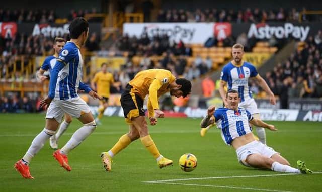 Brighton and Hove Albion defender Lewis Dunk had a VAR call go against him in the Premier League match at Wolves