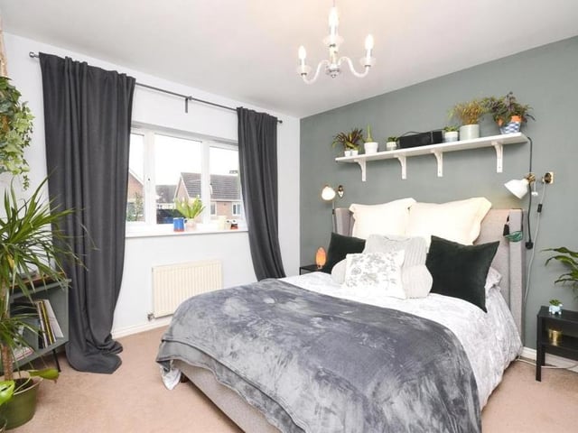 A good night's sleep is surely guaranteed in this tasteful second bedroom, which also benefits from en suite facilities.
