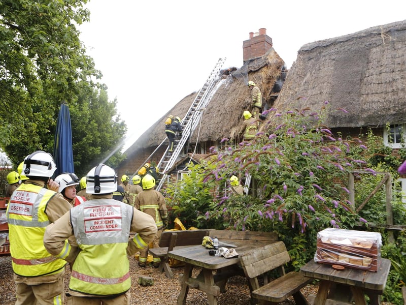 Firefighters at the Gribble Inn, in Oving, following a previous fire in July, 2014