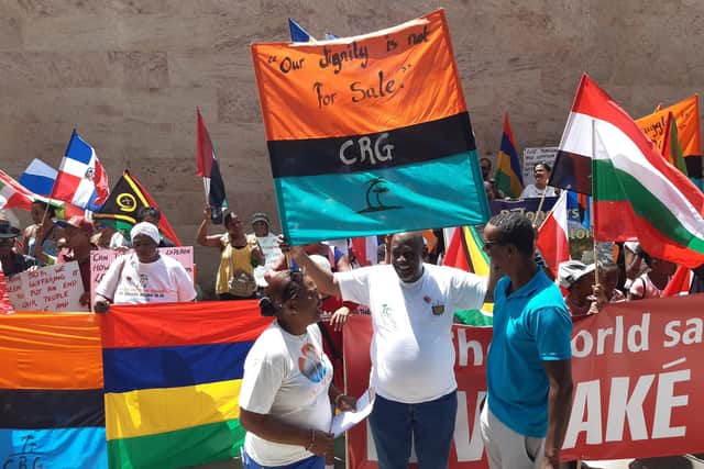 Demonstrators from the Chagos Islands in 2019 (Photo by JEAN MARC POCHE/AFP via Getty Images)