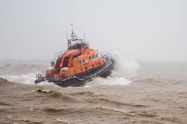The episode includes crew members from the Sussex branch rescuing two paragliders who had fallen into the sea on Christmas Eve last year.