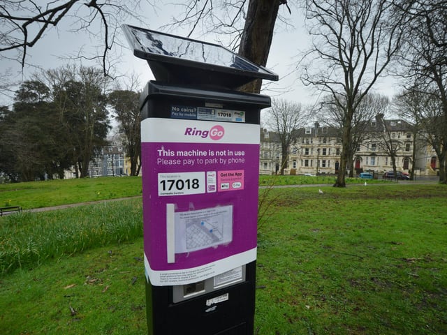 Parking meter that no longer accepts coins pictured in Hastings. Cornwallis Gardens.