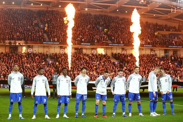 Brighton & Hove Albion players line up on the pitch prior to the UEFA Europa League 2023/24 match