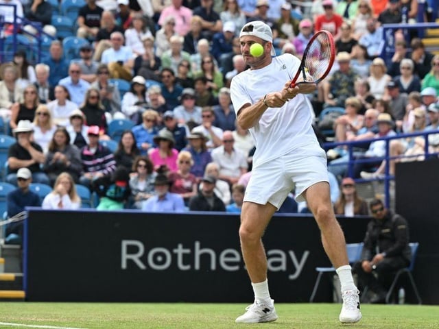 US player Tommy Paul returns to Argentina's Francisco Cerundolo during their men's singles final tennis match at the Rothesay Eastbourne International tennis tournament in Eastbourne, southern England, on July 1, 2023. (Photo by Glyn KIRK / AFP) (Photo by GLYN KIRK/AFP via Getty Images):Action from Saturday's finals at the Rothesay tennis international at Devonshire Park, Eastbourne