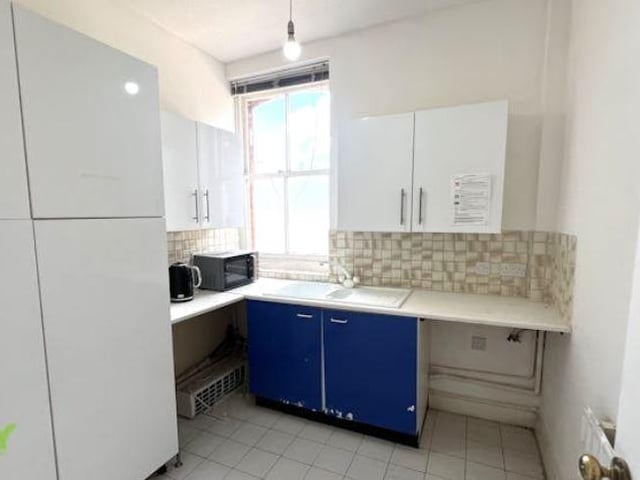 Both buildings have kitchens and male and female toilets
