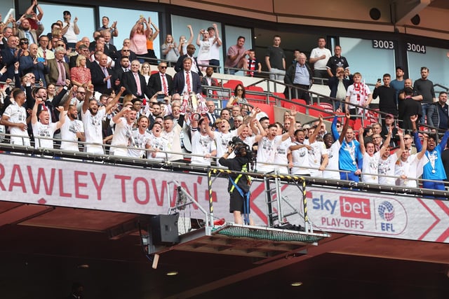 Crawley Town celebrated an historic day for the club after winning promotion to League One at Wembley with victory over Crewe.