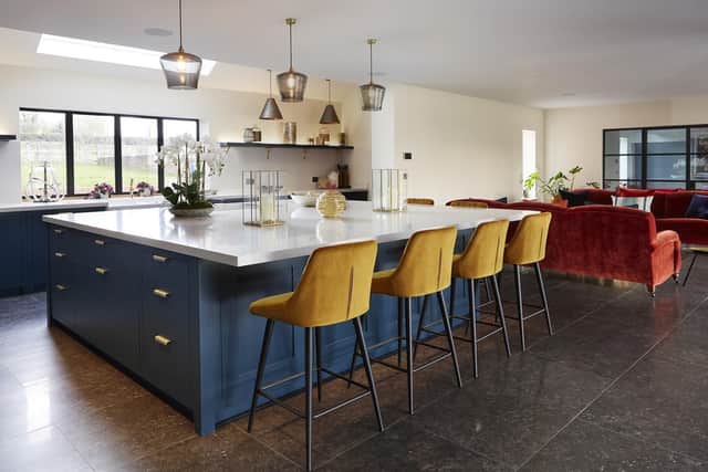 A kitchen island is one of the most desirable kitchen features