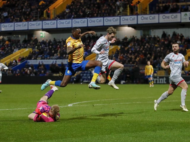 Action from Crawley Town's trip to Mansfield Town - a bit of synchronised jumping from Will Swan