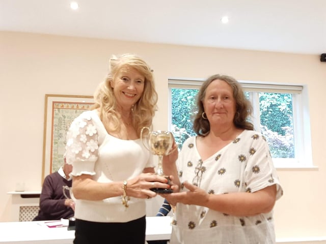 Caroline gives the Gayford Cup to Ann Wright