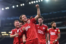 Danilo Orsi celebrates after scoring Crawley Town's fifth goal during the League Two play-off semi-final second leg match at Milton Keynes Dons. Picture by Harriet Lander/Getty Images