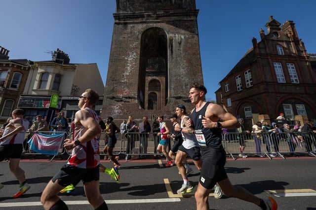 Participants pass the three mile mark as they run along Preston Road during The Brighton Marathon on Sunday 7th April 2024.Photo: Andrew Baker for London Marathon EventsFor further information: media@londonmarathonevents.co.uk:Images from the 2024 Brighton Marathon