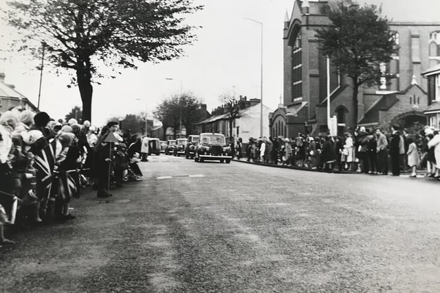Crowds line the street outside St Elisabeths Church in Victoria Drive to welcome the Queen to Eastbourne in 1966