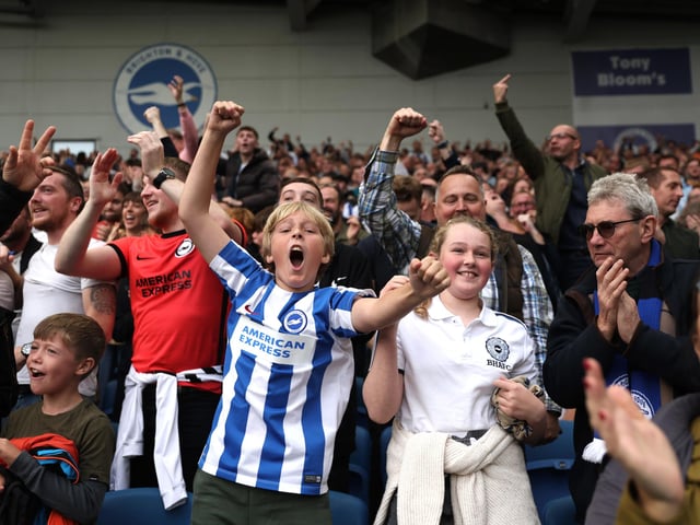 BRIGHTON, ENGLAND - OCTOBER 29: Brighton fans celebrate their sides first goal during the Premier League match between Brighton & Hove Albion and Chelsea FC at American Express Community Stadium on October 29, 2022 in Brighton, England. (Photo by Alex Pantling/Getty Images)