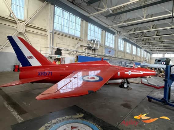 The Folland Gnat Tl XR571 is being prepared for its journey to Tangmere.