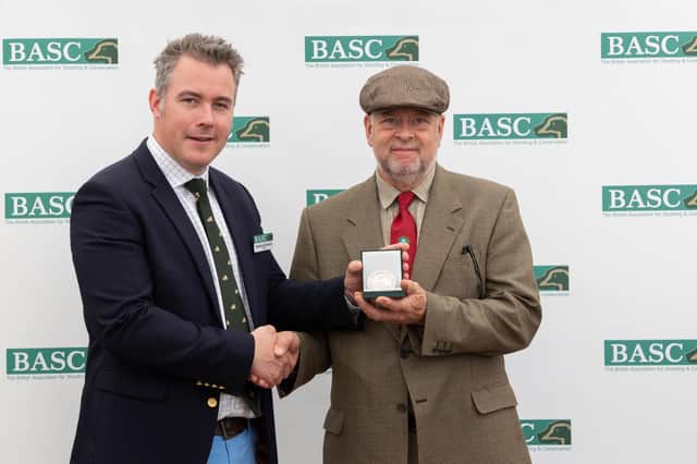 A stalwart of the Chichester wildfowling community has been celebrated for his contribution to country sports with the presentation of a newly-launched national award.