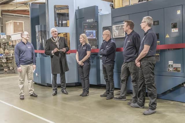 Haywards Heath town mayor Howard Mundin said he was delighted to help cut the ribbon at the unveiling of new CNC machining technology following significant investment in Unibloc Hugenic Technologies' UK premises in Bolney. Picture: pnoblephoto.net