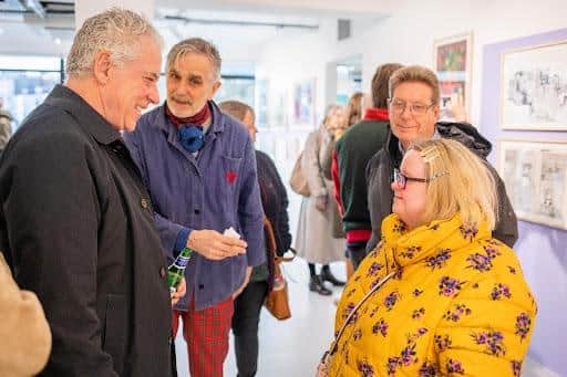Chair Charles Rolls and director Marc Steene speaking with artist Vicky Bowman, credit Phoebe Wingrove