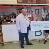 The Rotary Club of Bognor Hotham is supporting Bognor Regis RFC, with club president Nigel Neville presenting a £500 cheque for essential rugby equipment. Photo: Rotary Club of Bognor Hotham.