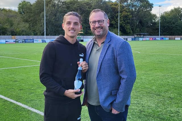 Tom Nichols receives the September Player of the Month Award from Crawley Observer editor Mark Dunford