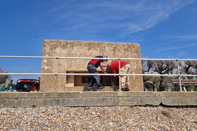 Pete Coe, one of the project leaders, and fellow former Royal Engineer Graham Cosham worked together to open the southern embrasure at the Ferring pillbox
