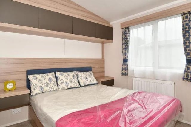 The property has two bedrooms, one of which has an ensuite shower room