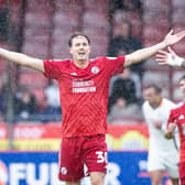 Will Wright celebrates scoring Reds' first goal of the season against Bradford City | Picture: Eva Gilbert