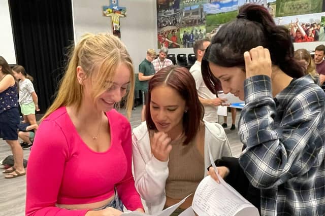 Students receiving their results.