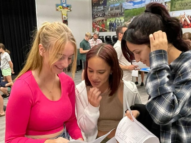 Students receiving their results.