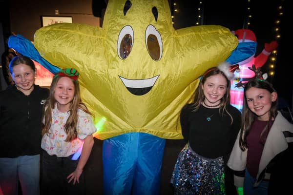 Year 7 students and the 'star' of the disco