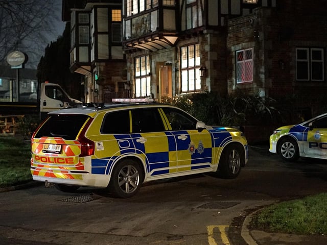 Police at the scene of the collision