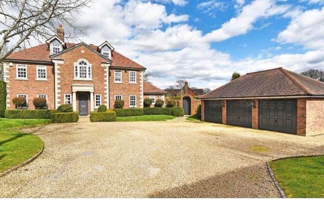 This five-bedroom family home comes complete with large garden and heated swimming pool