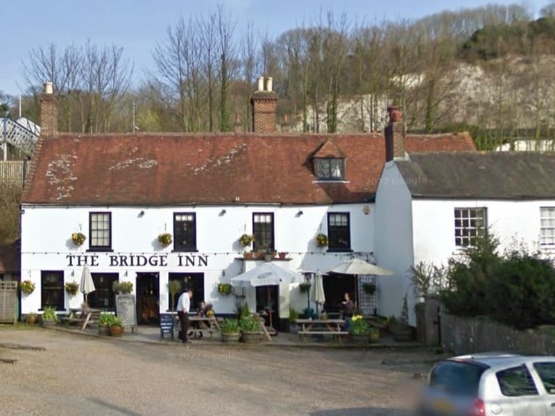 The Bridge Inn is a traditional pub situated in the South Downs with an average rating of 4.5 from over 500 reviews. One customer said: "Best welcome, service, food and music in Sussex!"