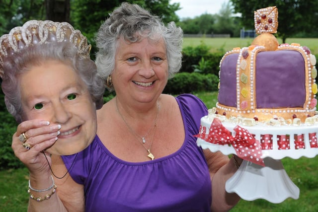 Diamond Jubilee party at Suzanne Green Day Centre. Janette Johnson, as the Queen, with a special birthday cake made by Nikki Jarvis
