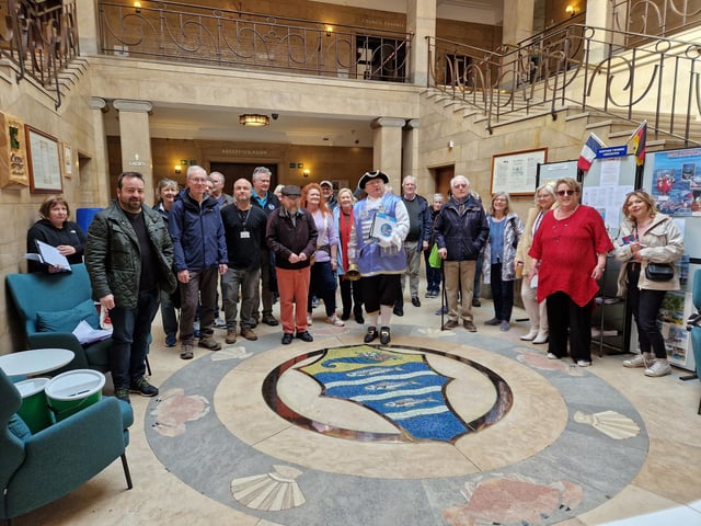 Worthing town crier Bob Smytherman launched his new walk on Tuesday, April 2, followed by afternoon tea at Worthing Town Hall to raise money for the mayor's charities, Broadwater Support Group and Community Hub, CYCALL inclusive cycling and the Parkinson's UK Worthing and Washington Group. Using information provided by The Worthing Society, Bob led a group of around 20 people on a three-hour walk around the town centre and seafront, giving many stories of the area's history en route.