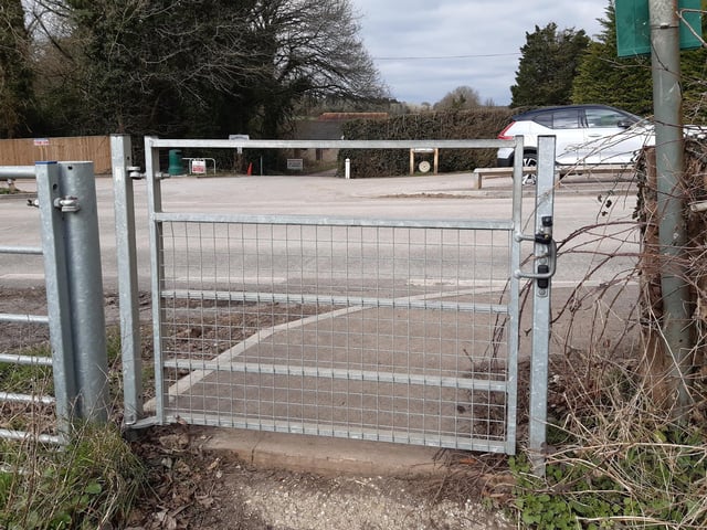 This takes you out to the A285 Petworth Road. If you are coming on the no.99 bus from Petworth, this is where the bus stop is.